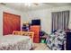 Bedroom with double bed and dresser at 22711 State Road 44, Eustis, FL 32736