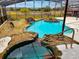 Relaxing pool and spa with waterfall feature at 22711 State Road 44, Eustis, FL 32736