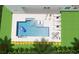 Aerial view of backyard pool with sun loungers, outdoor seating, and lush landscaping at 3867 Grassland Loop, Lake Mary, FL 32746