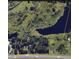 Aerial view of the property showing the water features, tree coverage and highway access at 6301 State Road 60 E, Bartow, FL 33830