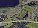 An aerial view of the property highlighting the layout of land, proximity to water, and highway access at 6301 State Road 60 E, Bartow, FL 33830