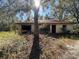 Small house with a garage, needs renovation at 6301 State Road 60 E, Bartow, FL 33830