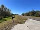 View of a long stretch of highway with green landscape and blue sky at 6301 State Road 60 E, Bartow, FL 33830