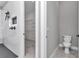 Bathroom featuring a soaking tub, shower, and toilet with stylish finishes at 8827 Sw 137Th Ct, Dunnellon, FL 34432