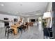 Open-concept living space with a dining area, modern kitchen, and stylish decor at 8827 Sw 137Th Ct, Dunnellon, FL 34432