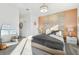 Bedroom featuring a bed, decor, a large mirror, and sunlit ambiance at 953 Splash Shot Pl # 953, Davenport, FL 33896
