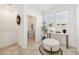 Welcoming foyer with an eye-catching decor, a glimpse into the laundry room, and plenty of natural light at 953 Splash Shot Pl # 953, Davenport, FL 33896