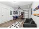 Finished garage featuring a ping pong table, basketball hoop, and comfortable seating at 953 Splash Shot Pl # 953, Davenport, FL 33896