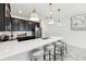 Bright kitchen boasts sleek countertops, stainless steel appliances, and modern pendant lighting at 953 Splash Shot Pl # 953, Davenport, FL 33896
