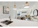 Kitchen island with open floor plan to dining and living areas, ideal for Gathering and social interaction at 953 Splash Shot Pl # 953, Davenport, FL 33896