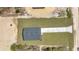 Aerial view of a newly built home featuring a well-manicured lawn and a private setting at 12561 Sw 81St St, Dunnellon, FL 34432