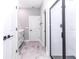 Contemporary bathroom showcasing a walk-in shower, elegant fixtures, and neutral tones for a calming ambiance at 12561 Sw 81St St, Dunnellon, FL 34432