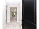 The entryway showcases wood-look floors that flow into the open-concept floor plan at 12561 Sw 81St St, Dunnellon, FL 34432