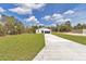 Attractive new construction home on a sprawling green lawn with ample space to build at 12561 Sw 81St St, Dunnellon, FL 34432