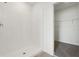 Modern bathroom featuring a tiled shower with white tiling and a tile floor at 1324 Oak Valley Dr, Auburndale, FL 33823