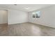 Cozy bedroom with a window and tile floors. Ready for your personal touch at 1337 Oak Valley Dr, Auburndale, FL 33823