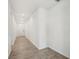 Bright hallway featuring tiled floors and recessed lighting at 1337 Oak Valley Dr, Auburndale, FL 33823