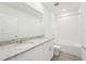 Bathroom featuring double sinks, granite countertop and shower at 1341 Oak Valley Dr, Auburndale, FL 33823