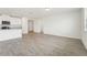 Bright living space featuring tile flooring and a modern kitchen at 1341 Oak Valley Dr, Auburndale, FL 33823