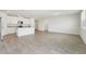 Bright living space featuring tile flooring and a modern kitchen at 1341 Oak Valley Dr, Auburndale, FL 33823