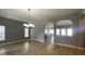 Dining room with view of the kitchen featuring neutral paint and tile floors at 1727 Saffron Plum Ln, Orlando, FL 32828