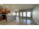 Open living room featuring tile flooring, neutral paint and lots of natural light at 1727 Saffron Plum Ln, Orlando, FL 32828