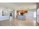 Open-concept living space with tile flooring and seamless flow into the kitchen area at 1727 Saffron Plum Ln, Orlando, FL 32828