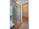 Bathroom featuring a glass enclosed shower with tile surround and chrome fixtures at 1727 Saffron Plum Ln, Orlando, FL 32828