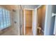 Bathroom featuring a glass-enclosed shower and a nearby separate toilet room at 1727 Saffron Plum Ln, Orlando, FL 32828