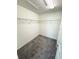 Walk-in closet featuring carpet, wire shelving, and a light at 2906 Fieldwood Cir, St Cloud, FL 34772