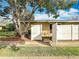 Fenced backyard with patio, perfect for outdoor relaxation and privacy with mature landscaping at 542 Cascade Cir # 102, Casselberry, FL 32707