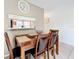 Dining area with wood table and chairs at 542 Cascade Cir # 102, Casselberry, FL 32707