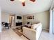 Comfortable living room featuring tile floors and access to outdoor patio at 542 Cascade Cir # 102, Casselberry, FL 32707