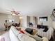 Spacious open concept living room and dining area, with a view towards the TV at 542 Cascade Cir # 102, Casselberry, FL 32707