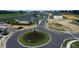 Aerial view of a new community with a roundabout and homes at 686 Creeping Fig St, Apopka, FL 32703