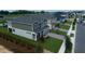 Aerial view of two story townhouses in a new community at 686 Creeping Fig St, Apopka, FL 32703