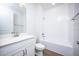 Simple bathroom with a single vanity, toilet and bathtub at 686 Creeping Fig St, Apopka, FL 32703