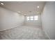 Spacious bedroom with neutral walls and carpet flooring at 686 Creeping Fig St, Apopka, FL 32703