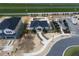 Aerial view of community clubhouse with pool, landscaping, and parking at 686 Creeping Fig St, Apopka, FL 32703