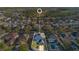 Aerial view highlighting the home's location within a residential community at 13655 Podocarpus Ln, Orlando, FL 32828