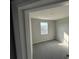 View of a bedroom with carpet, a window with a view and a neutral color palette at 576 Pothos St, Apopka, FL 32703
