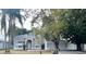 Charming two-story home with well-maintained landscaping and mature trees, creating an inviting curb appeal at 2708 Smithfield Dr, Orlando, FL 32837