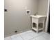 Laundry room featuring tile flooring, sink and hookups for washer and dryer at 2708 Smithfield Dr, Orlando, FL 32837
