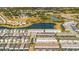 Community overview, featuring lake and homes at 7420 Oakmoss Loop, Davenport, FL 33837