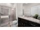 Bathroom with granite vanity, large shower and tile flooring at 7420 Oakmoss Loop, Davenport, FL 33837