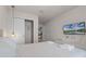 Primary bedroom with a king bed, large closet, and TV at 7420 Oakmoss Loop, Davenport, FL 33837