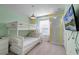 bedroom with a bunk bed, Mickey Mouse decor, and TV at 7420 Oakmoss Loop, Davenport, FL 33837