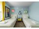 Twin bedroom with Toy Story decor and ample closet space at 7420 Oakmoss Loop, Davenport, FL 33837