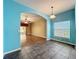 Bright dining area with light blue walls and tile floor at 103 Shire Ct, Sanford, FL 32773