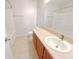 Bathroom features a tub and shower combination and a sink and vanity at 1208 Sawgrass Pointe Dr, Orlando, FL 32824